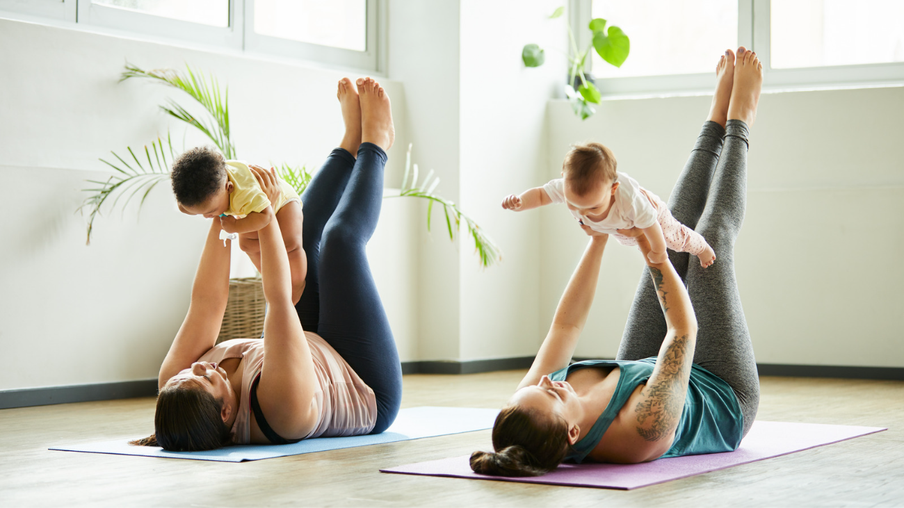 two new mums participating in baby yoga
