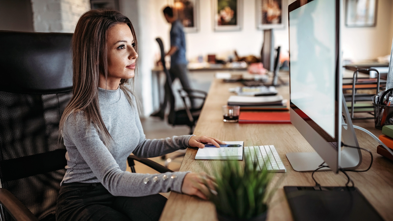 woman using business tool on computer