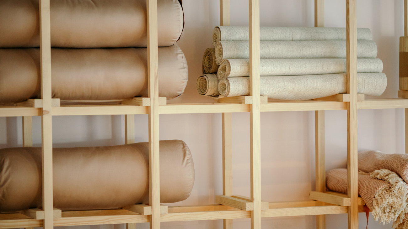 Yoga studio equipment on a rack
